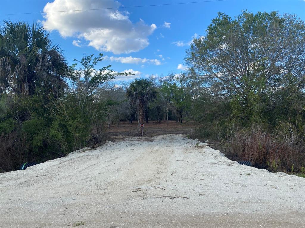 Build or bring your dream home and barn on this beautiful and private high and dry 1.25 acre cleared and culvert already in place just off of the main paved road but yet still private. with Power poles on this street So much to enjoy in Okeechobee County. Come to The Kissimmee River Preserve State Park West of this area as well is the Kissimmee River. The Kissimmee River flows into Lake Okeechobee and is well known for some of the best fishing. whether you like Fishing, hunting, mudding agriculture or just privacy here you have it all.