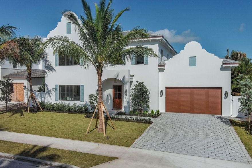 NEW CONSTRUCTION- Dutch West Indies home designed and built to the highest structural standards with custom details, wide plank oak floors throughout in addition to custom details and finishes. Designed for entertaining, the open floor-plan offers soaring ceilings, expansive rooms and gracious scale. Located a block away from the Intracoastal waterway, this  +/- 4400 sqft residence offers a luxurious first floor primary suite with marble bath and two custom designed, fully outfitted closets. There are 3 additional large bedrooms, each with their own ensuite baths and a 2nd floor office/family room. The kitchen is a Chef's dream, appointed with Thermador 6 burner gas range and appliances, Taj Mahal quartzite countertops, custom cabinetry, wine refrigerator. Additional features include,