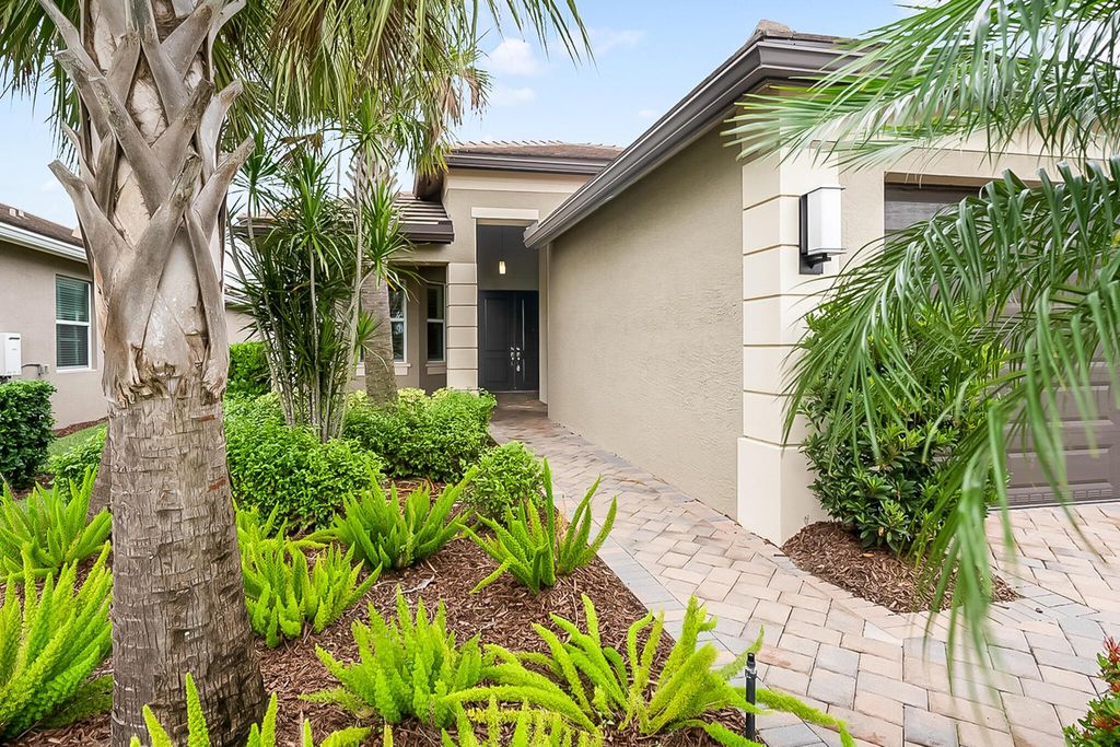 Photo of 10739 SW Sunray Street, Port Saint Lucie, FL 34987 (MLS # R10937802)