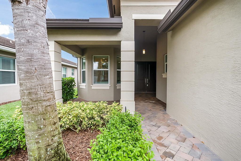 Photo of 10739 SW Sunray Street, Port Saint Lucie, FL 34987 (MLS # R10937802)