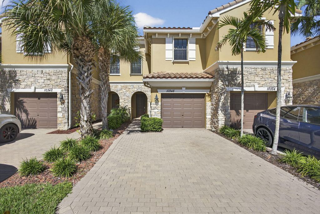 Photo of 10348 Wellington Parc Drive, Wellington, FL 33449 (MLS # R11138575)