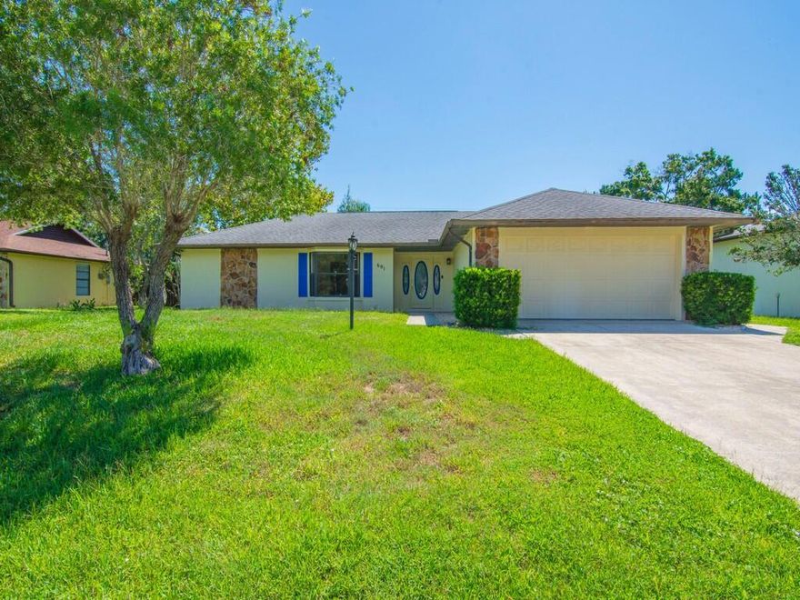 Bring your toys and your dreams! NO HOA! This rare .46-acre, two-lot property offers a 3BR/2BA home with an attached 2-car garage, sparkling screen-enclosed pool, and pre-plumbed cabana for outdoor entertaining. The real star is a 1,690 sq ft home PLUS a separate 1,500 sq ft bonus building! Store your RV, boat, car collection, and equipment indoors, or create the ultimate workshop or hobby haven in this massive space with electric and water. Endless possibilities in a private, versatile setting to play, relax, and live the life you have worked so hard for! Buyer to verify measurements.