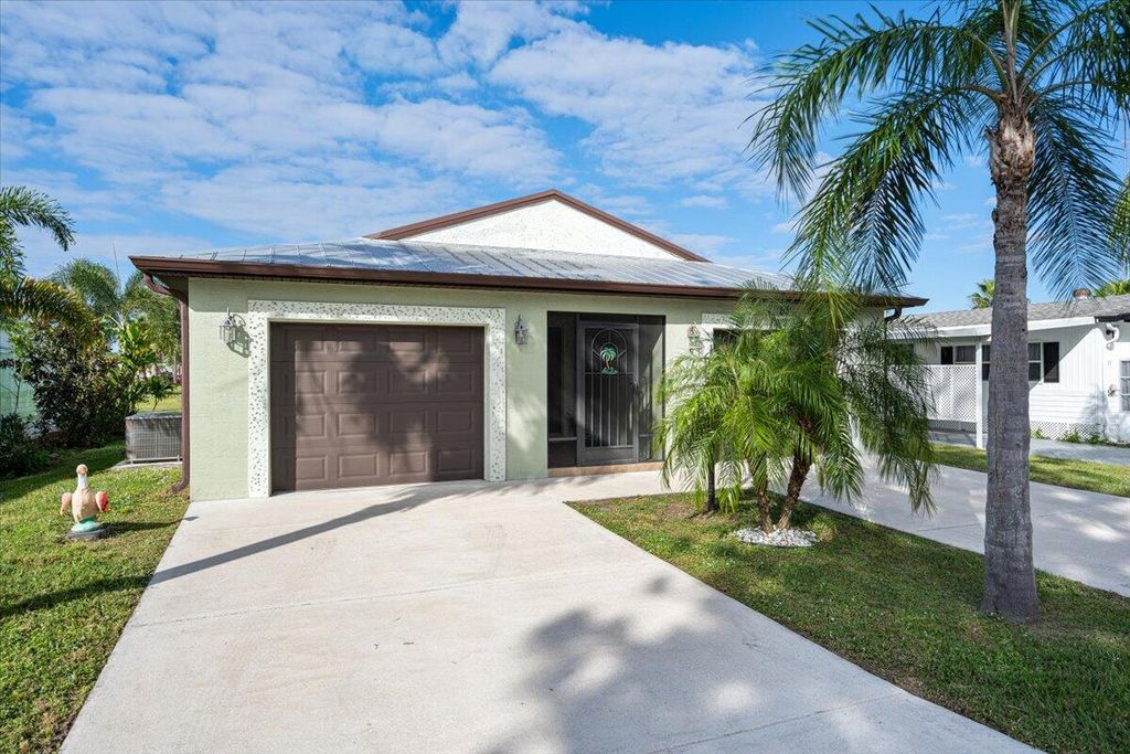 Photo of 55 Golf Drive, Port Saint Lucie, FL 34952 (MLS # R11159079)