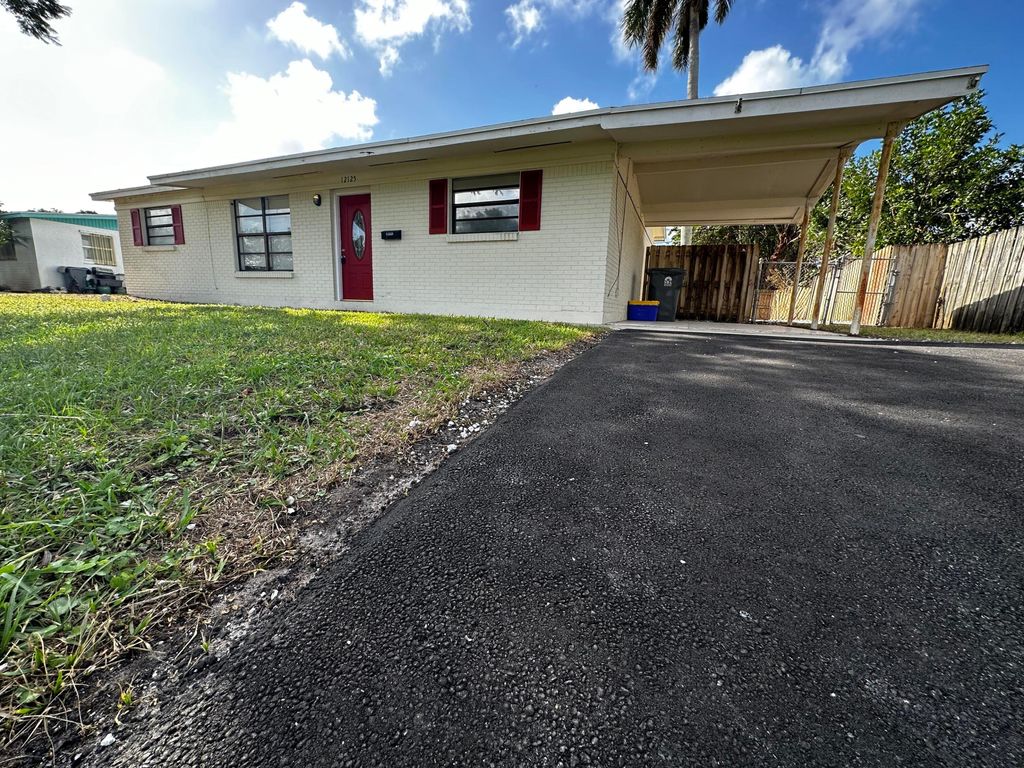 Photo of 12125 Colony Avenue, Palm Beach Gardens, FL 33410 (MLS # R11032475)