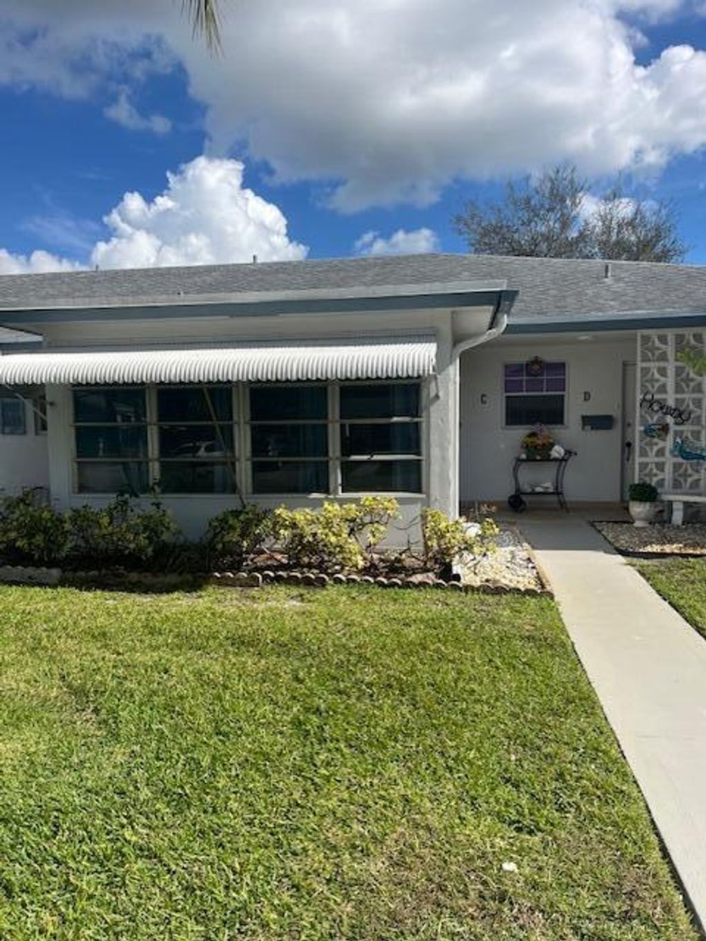 Photo of 1157 S Drive Circle #C, Delray Beach, FL 33445 (MLS # R11156751)