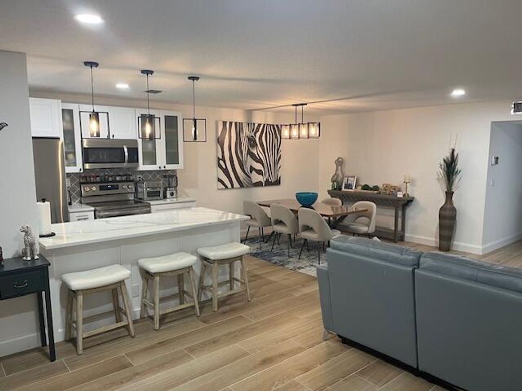 Photo of 1157 S Drive Circle #C, Delray Beach, FL 33445 (MLS # R11156751)