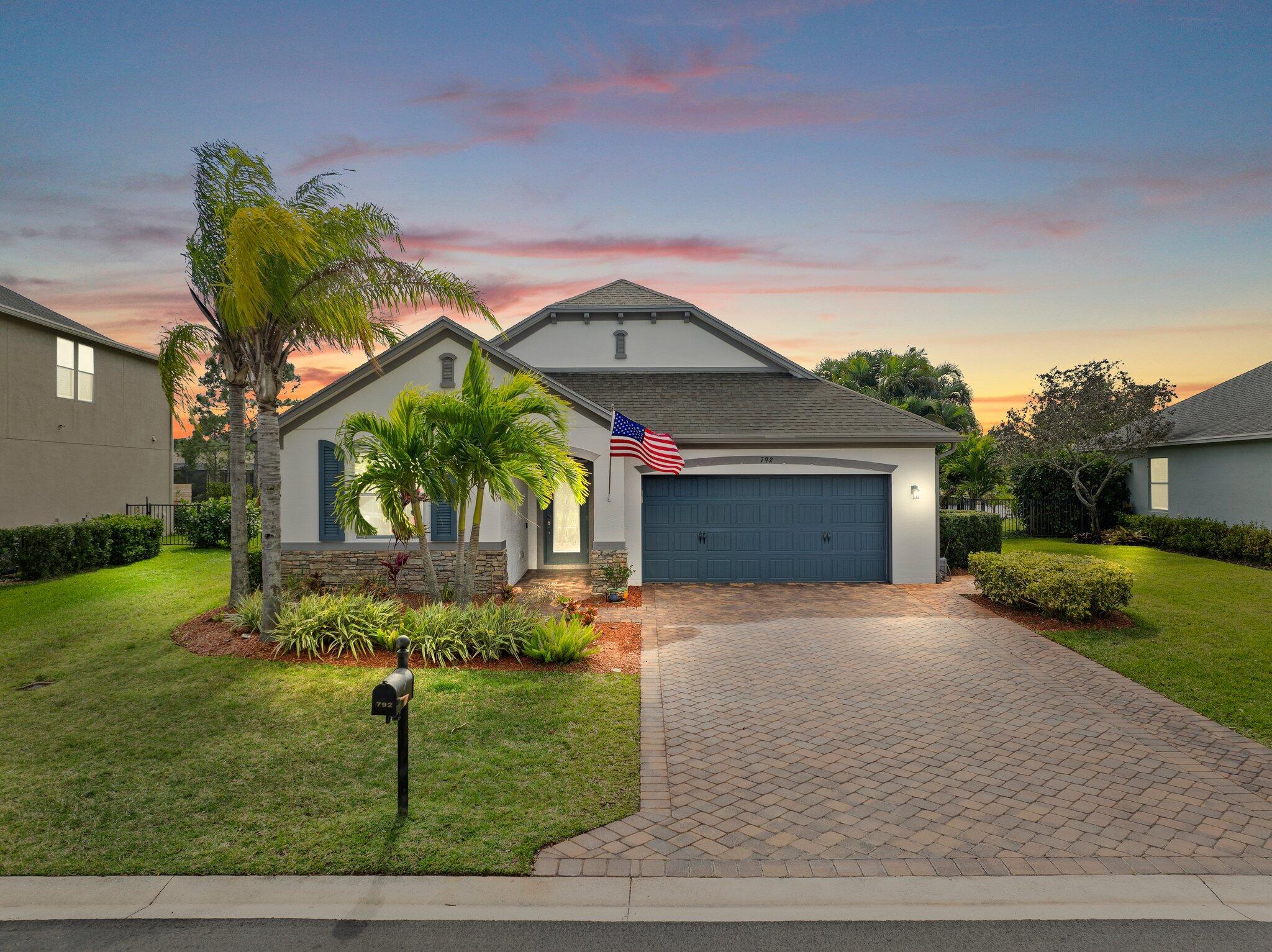 Meticulous 3 bedroom 2 bathroom 2 car garage pool home with lake views in the sought after community of Copperleaf in Palm City. Family orientated neighborhood with ample amenities including playground, clubhouse, pickleball & more! This home boasts a light & bright interior with crown molding, newer AC & water heater, open floor-plan and nice size guest rooms. Updated kitchen with Quartz countertops, Herringbone tile backsplash, oak cabinets, new black stainless steel appliances & large pantry. Spacious primary suite with shiplap accent wall, walk-in closets, dual sinks, soaking tub & frameless shower. Entertain family & friends outside under the covered patio, completely fenced yard offers lake views, paver deck & heated, salt water pool that's perfect for those hot summer days!