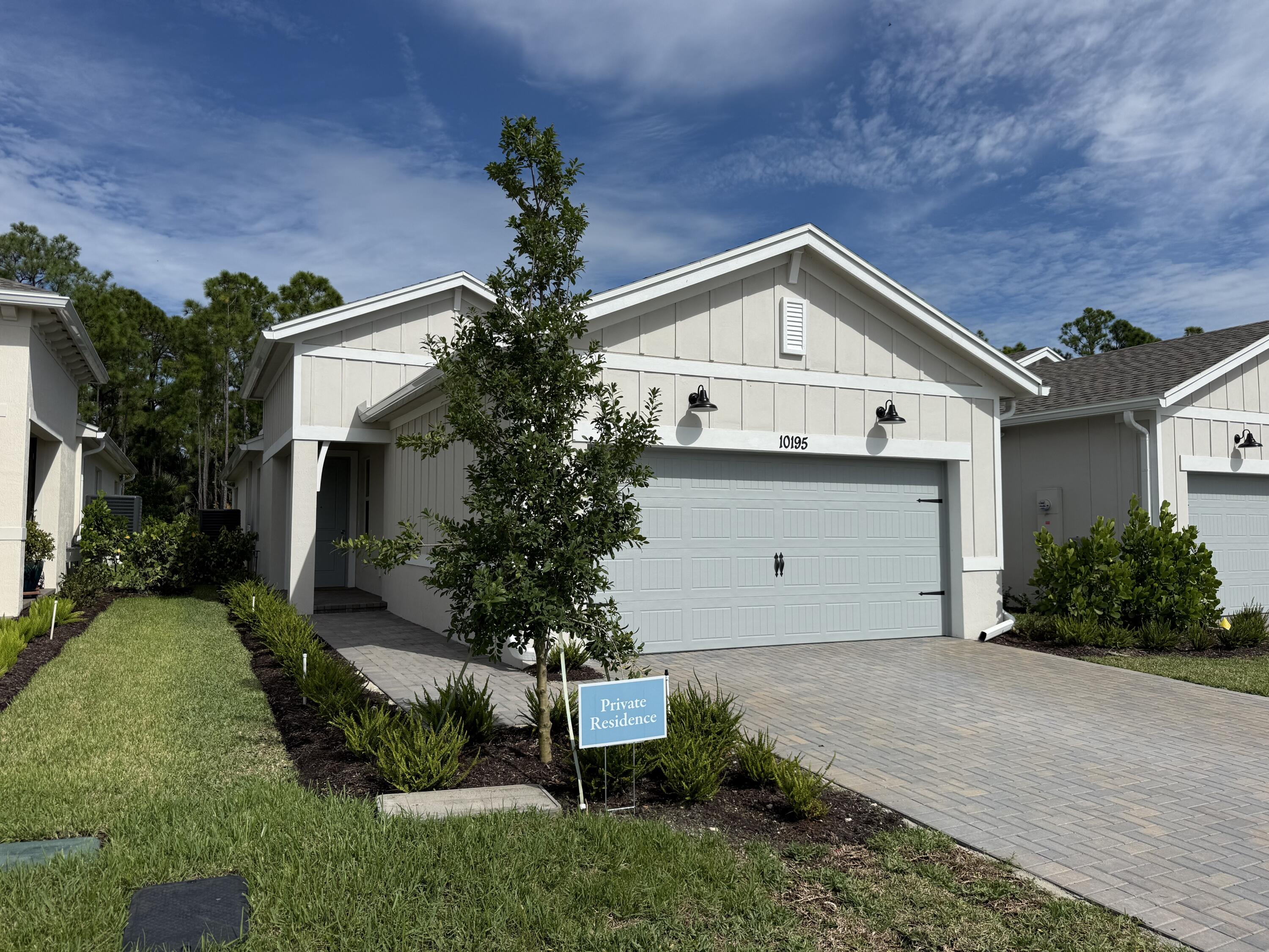 Elegant Spring Lake IV Villa with Preserve Views located in Four Seasons at Wylder, Port St. Lucie's premier 55+ community. This home captures abundant natural light and offers tranquil preserve views for a private, peaceful setting. The thoughtfully designed open layout blends style and functionality. The kitchen features pristine white soft-close cabinetry, gleaming quartz countertops, GE stainless steel appliances, and a professional-style gas range with stainless hood. Overlooking the great room and dining area, the kitchen allows for effortless entertaining and everyday convenience. A 12' sliding glass door opens the living space to the covered lanai. Home is partially furnished and has plantation shutters throughout.