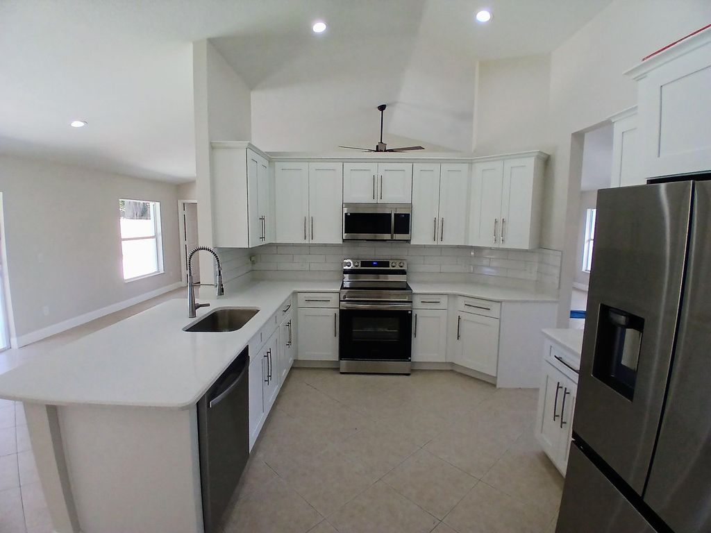 Photo of 3450 SW Martin Street, Port Saint Lucie, FL 34953 (MLS # R11150187)