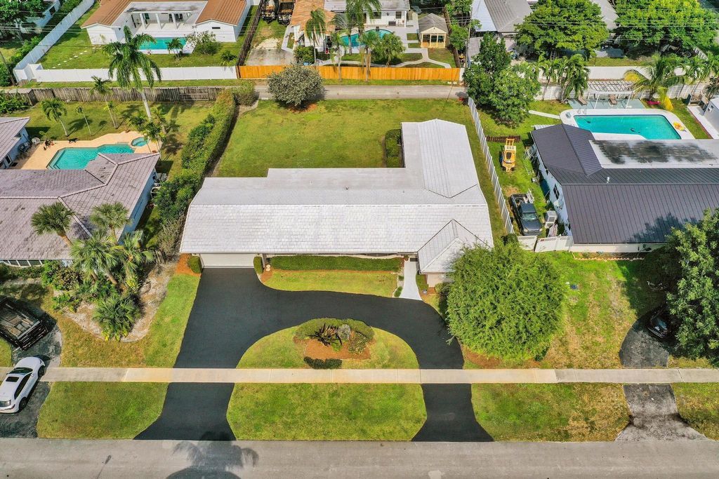 Photo of 5011 Madison St, Hollywood, FL 33021 (MLS # F10538108)