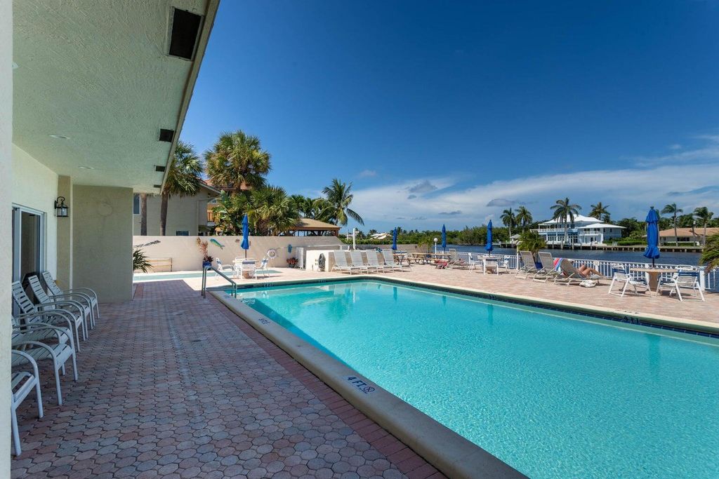 Photo of 650 Snug Harbor Drive #G301, Boynton Beach, FL 33435 (MLS # B26035397)