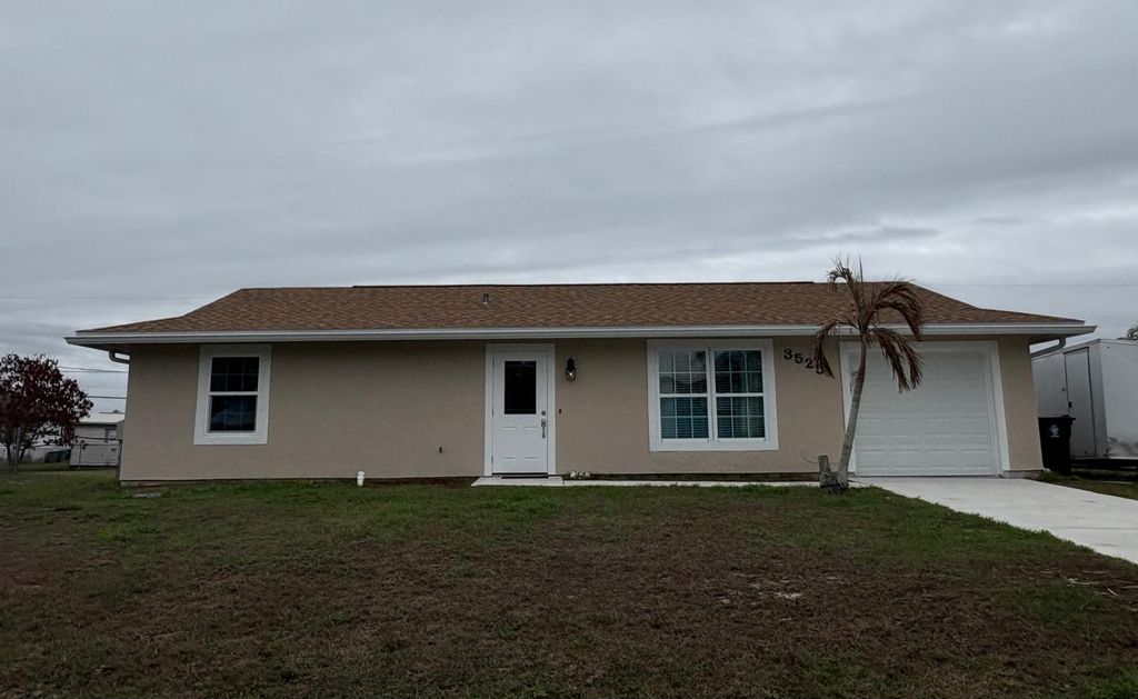 Photo of 3525 SW Rivera Street, Port Saint Lucie, FL 34953 (MLS # B26003564)