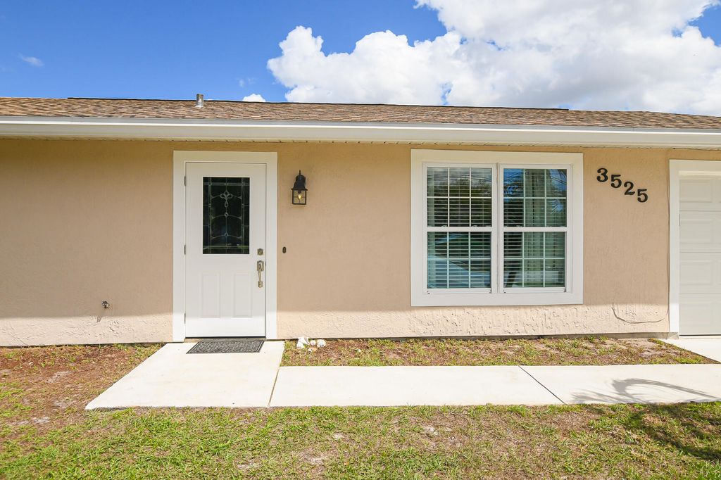 Photo of 3525 SW Rivera Street, Port Saint Lucie, FL 34953 (MLS # B26003564)