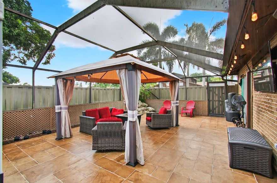 Welcome to Boca Gardens! This 3-bed, 3.5 bath townhome is the perfect blend of comfort & style in the heart of Boca Raton. The open floor plan has a living area with vaulted ceilings and skylights. The kitchen with stainless steel appliances and a dining space ideal for entertaining. The primary suite on the first floor has a large closet and soaker tub. 2 bedrooms on the other side with plenty of space for family or guests. Florida living at its finest, with a private fenced patio perfect for relaxing or dining. Boca Gardens is a beautiful community with resort-style amenities, 3 pools, pickleball, tennis & basketball courts, fitness center, playground. Located near top-rated schools, shopping, dining, and major highways. AC 2019 | WH 2016 | Roof 2023