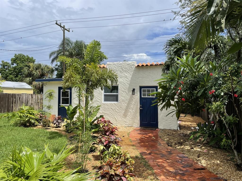 Photo of 315 Hawthorne Drive, Lake Park, FL 33403 (MLS # R10881003)