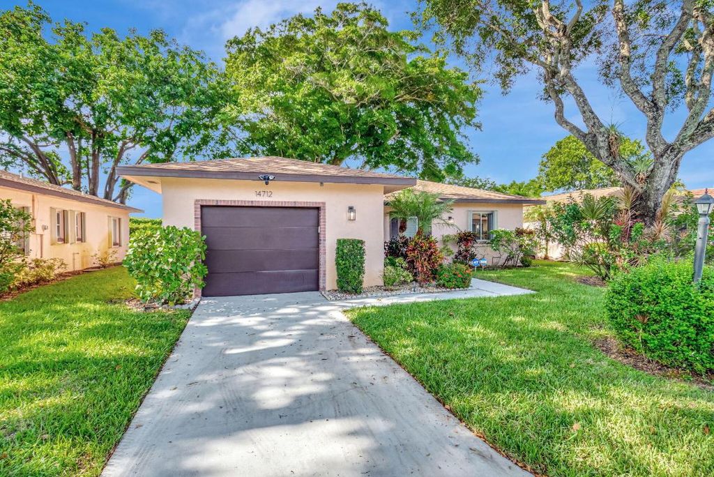 Photo of 14712 Bonaire Boulevard, Delray Beach, FL 33446 (MLS # R11139983)