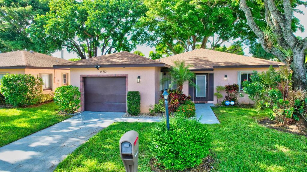 Photo of 14712 Bonaire Boulevard, Delray Beach, FL 33446 (MLS # R11139983)