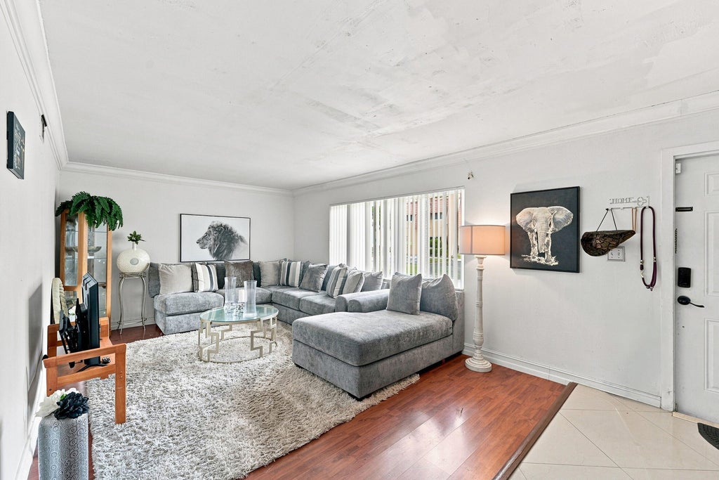 Photo of 6 Spinning Wheel Lane, Tamarac, FL 33319 (MLS # B26066548)
