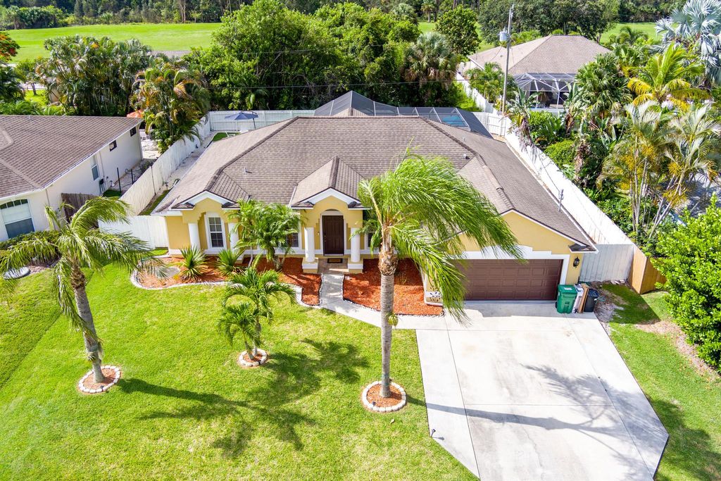 Photo of 1180 SE Palm Beach Road, Port Saint Lucie, FL 34952 (MLS # R11010910)