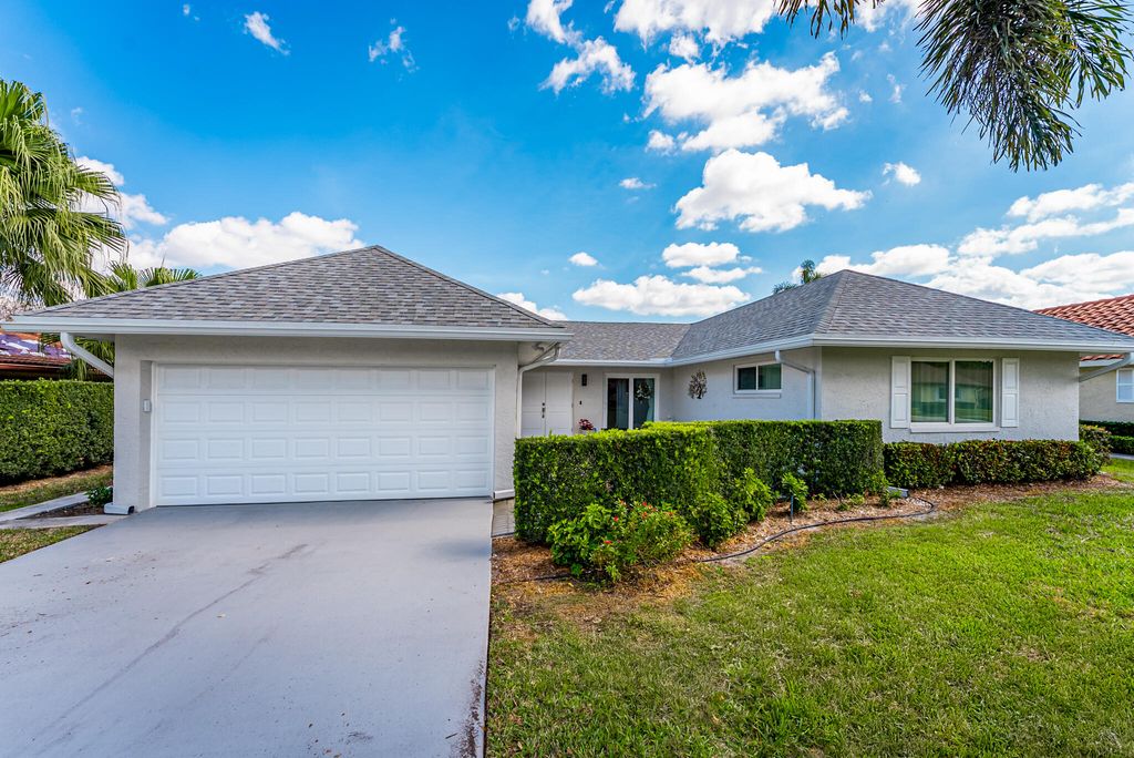 Photo of 10370 Greentrail Drive N, Boynton Beach, FL 33436 (MLS # R11164184)