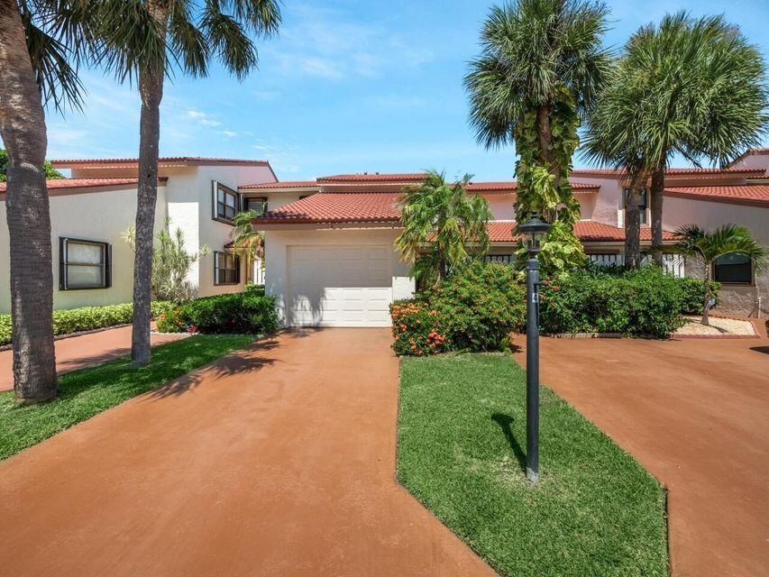 Walk to the beach! This gorgeous, updated, spotlessly clean and well appointed townhome is the perfect vacation spot in beautiful Jupiter. Double Master bedrooms, one with king bed, second with queen, both with balcony. Downstairs bedroom with double bed and patio. Laminate floors throughout. Den with convertible sofa. Large living areas are perfect for entertaining and dining with friends. Peaceful patio with space to relax and enjoy. Washer and dryer. One car garage. Impact glass. AMAZING LOCATION! Walk to beach, pool, shopping, world class dining and entertainment, watersports, boating, golf, fishing and more! If you are looking for the perfect place to relax, enjoy friends and family and experience the ultimate Florida vacation home, this is it! Pick up trucks ok.