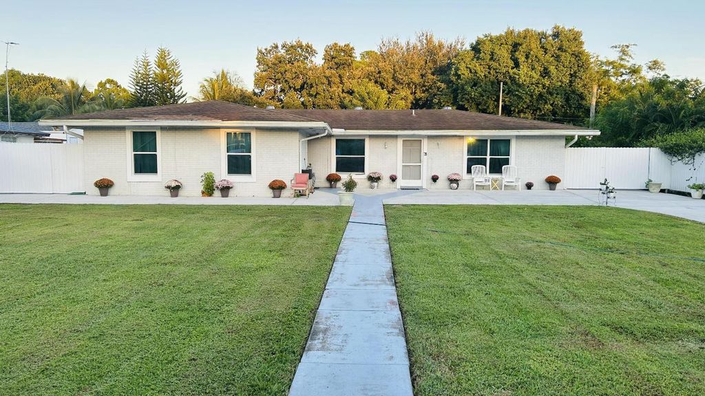 Photo of 2084 Laura Lane, West Palm Beach, FL 33415 (MLS # R11132050)