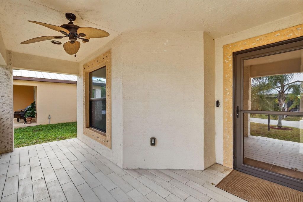 Photo of 5 Flamenco Way, Port Saint Lucie, FL 34952 (MLS # F10543816)