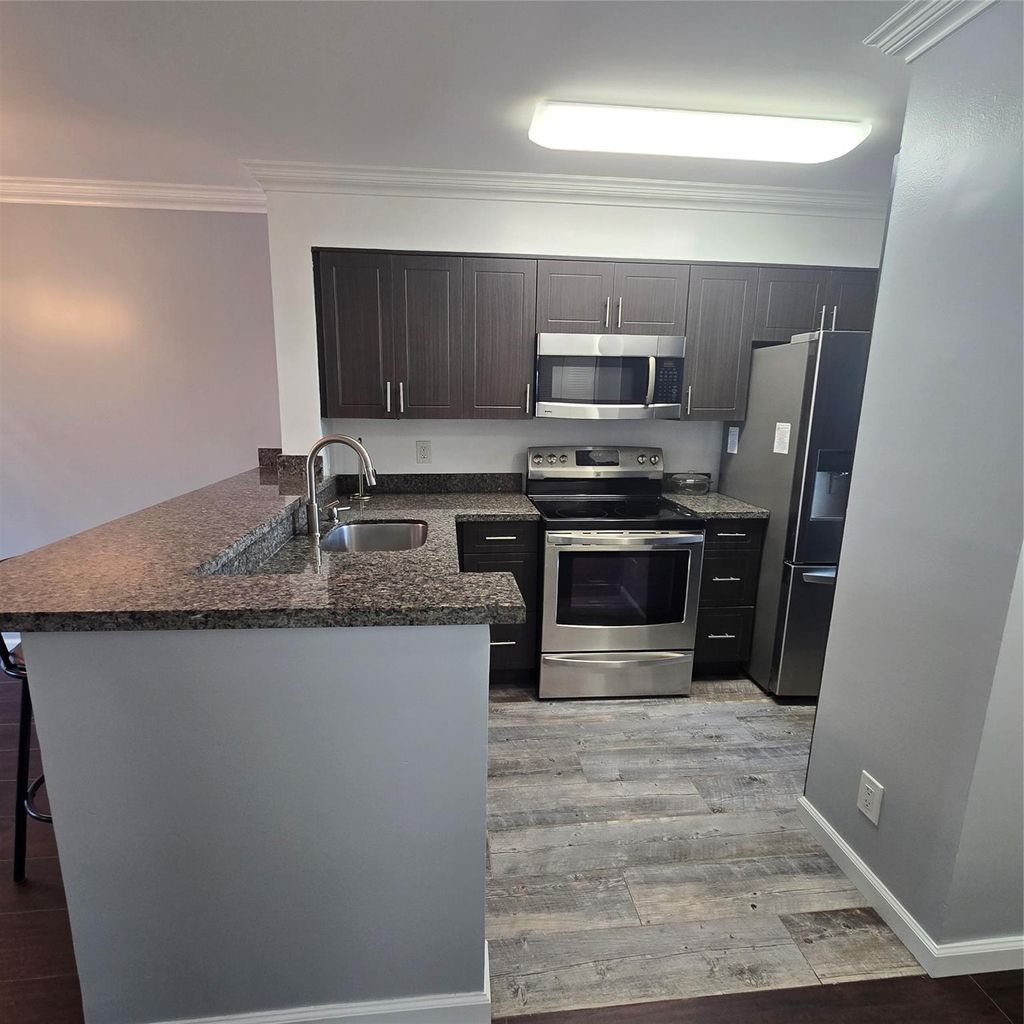 Photo of 2108 S Cypress Bend Drive #301, Pompano Beach, FL 33069 (MLS # F10480866)