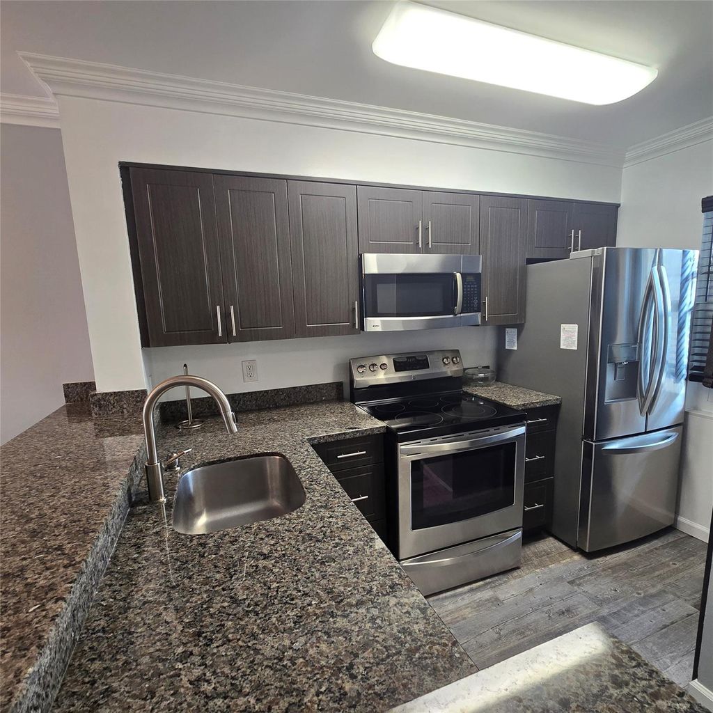 Photo of 2108 S Cypress Bend Drive #301, Pompano Beach, FL 33069 (MLS # F10480866)