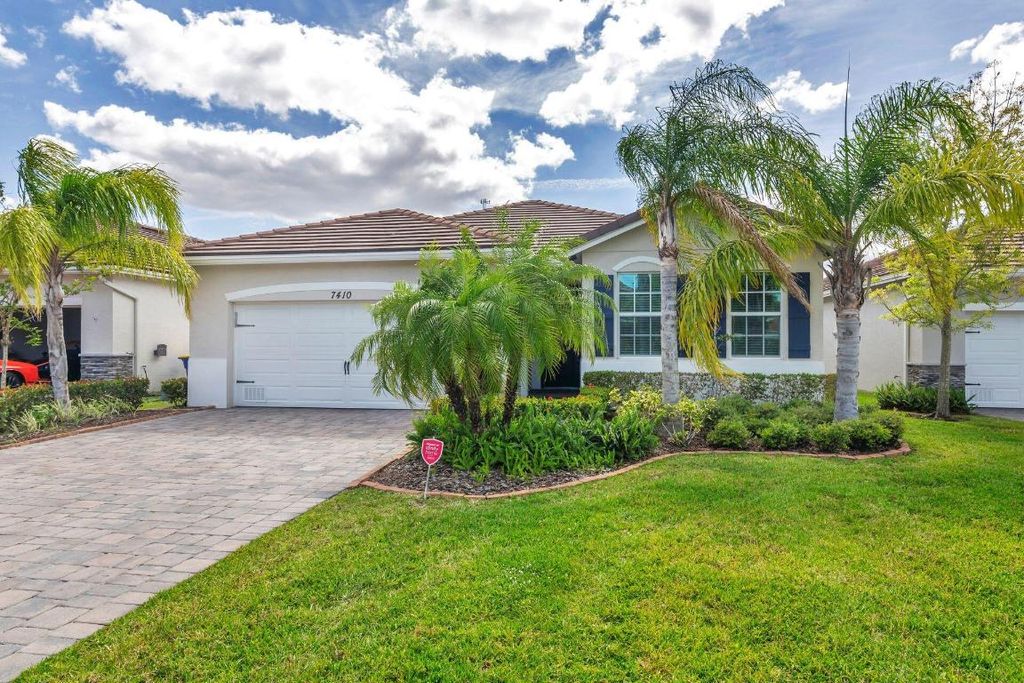 Photo of 7410 SW Harbor Cove Drive, Stuart, FL 34997 (MLS # R10977269)