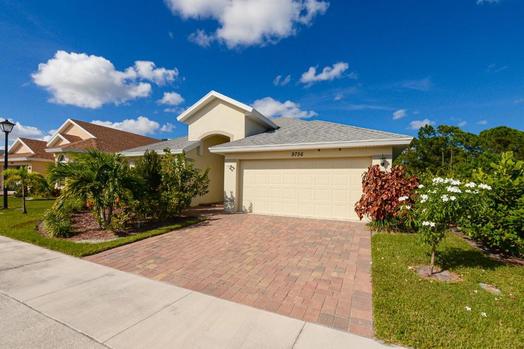 Photo of 9756 Palm Breezes Drive S, Fort Pierce, FL 34945 (MLS # R10934146)