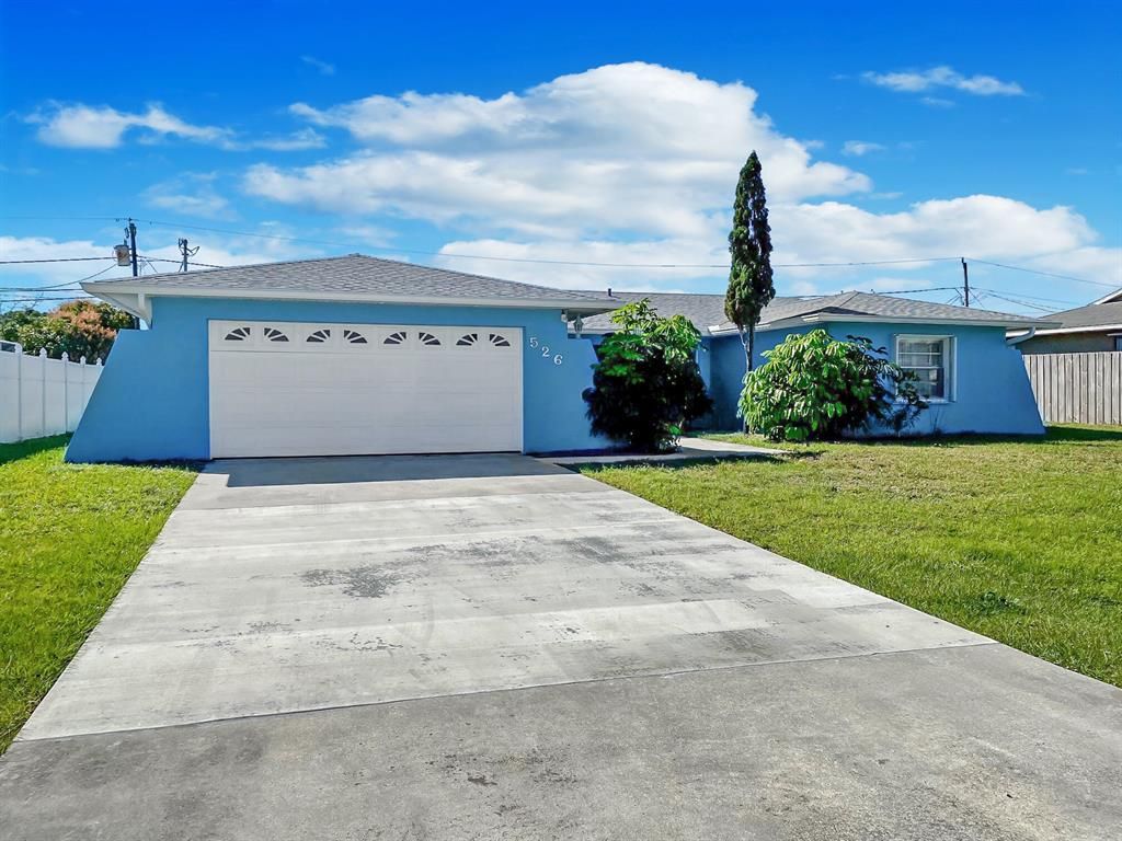 Photo of 526 SE Anchor Lane, Port Saint Lucie, FL 34983 (MLS # R10772316)