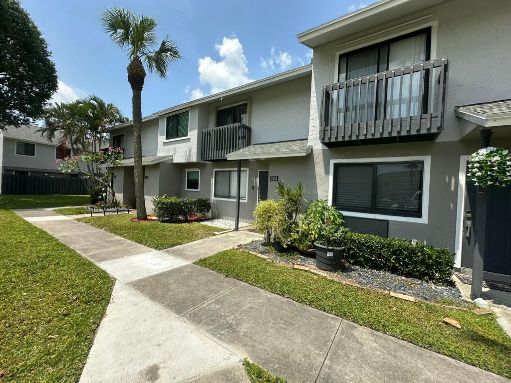 Photo of 2404 Seaside Drive, Greenacres, FL 33463 (MLS # B26023429)