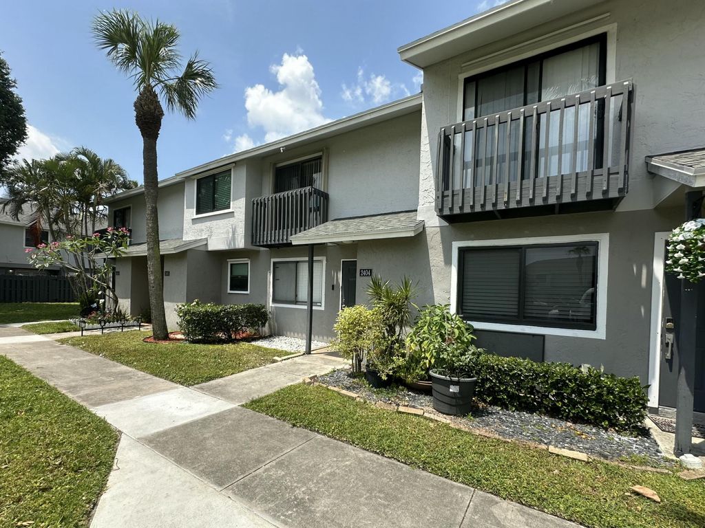 Photo of 2404 Seaside Drive, Greenacres, FL 33463 (MLS # B26023429)