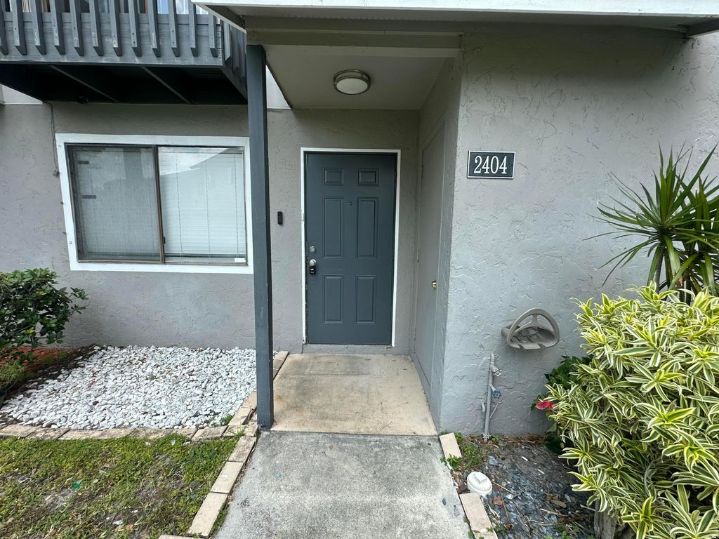 Photo of 2404 Seaside Drive, Greenacres, FL 33463 (MLS # B26023429)