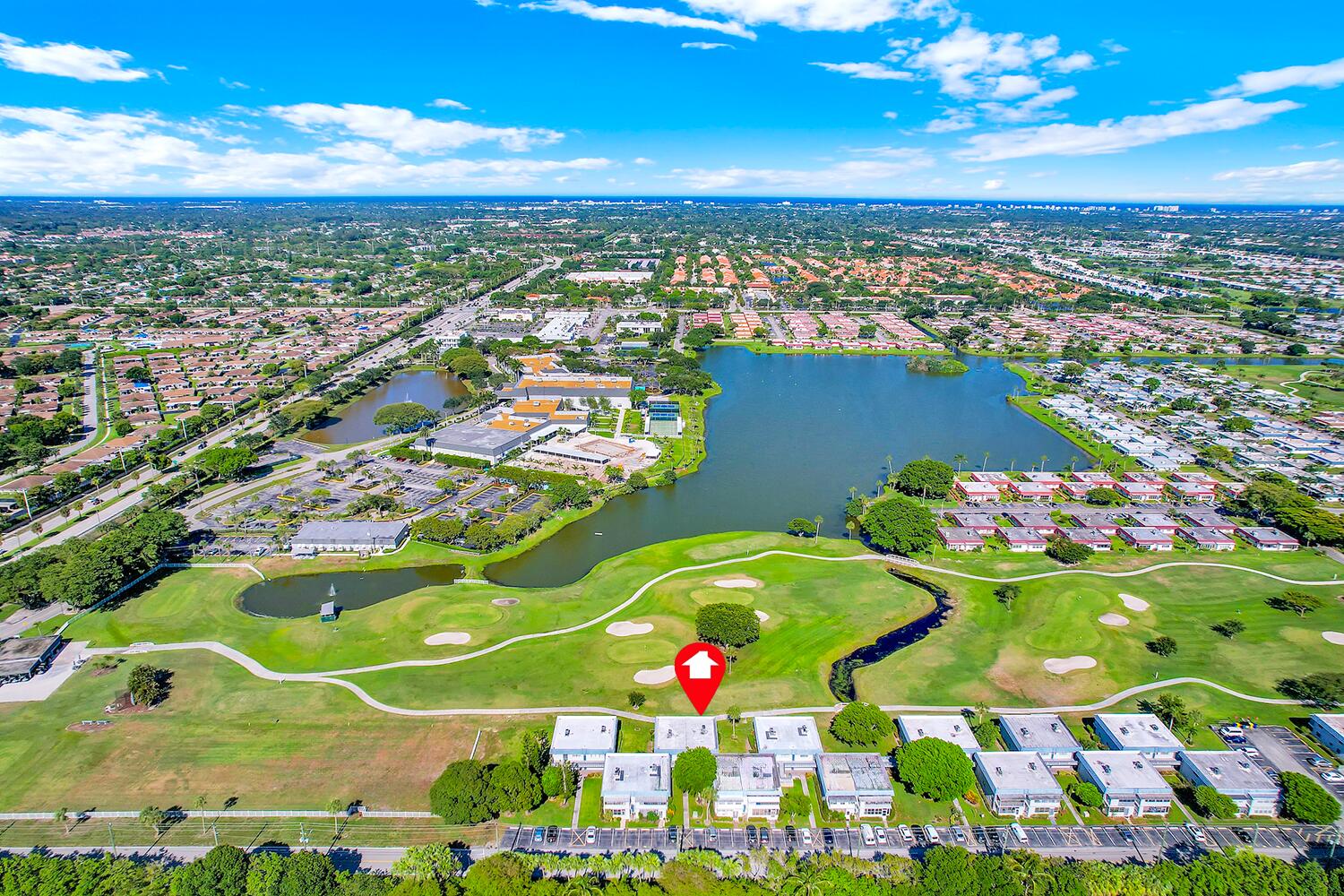 GOLF COURSE & WATER VIEWS from this top-floor condo with no upstairs neighbors features a screened-in balcony located in the highly sought-after Tuscany B section of Kings Point Golf & Country Club. This 2nd floor condo offers stairs or elevator to the 1 bedroom, 1.5 baths and a private in-unit washer & dryer.Enjoy the active resort-style lifestyle with two 18-hole golf courses, 5 outdoor pools, tennis courts, pickleball, bocce, shuffleboard, a fitness center, on-site dining, and more. Offered, furnished or unfurnished, giving you the flexibility to move right in or personalize it to your taste. Only 6 from Delray's sandy beaches, dining, art galleries, shops along Historic Atlantic Ave. One resident must be 55 years of age or older. Bring all offers! Some photos virtually staged.