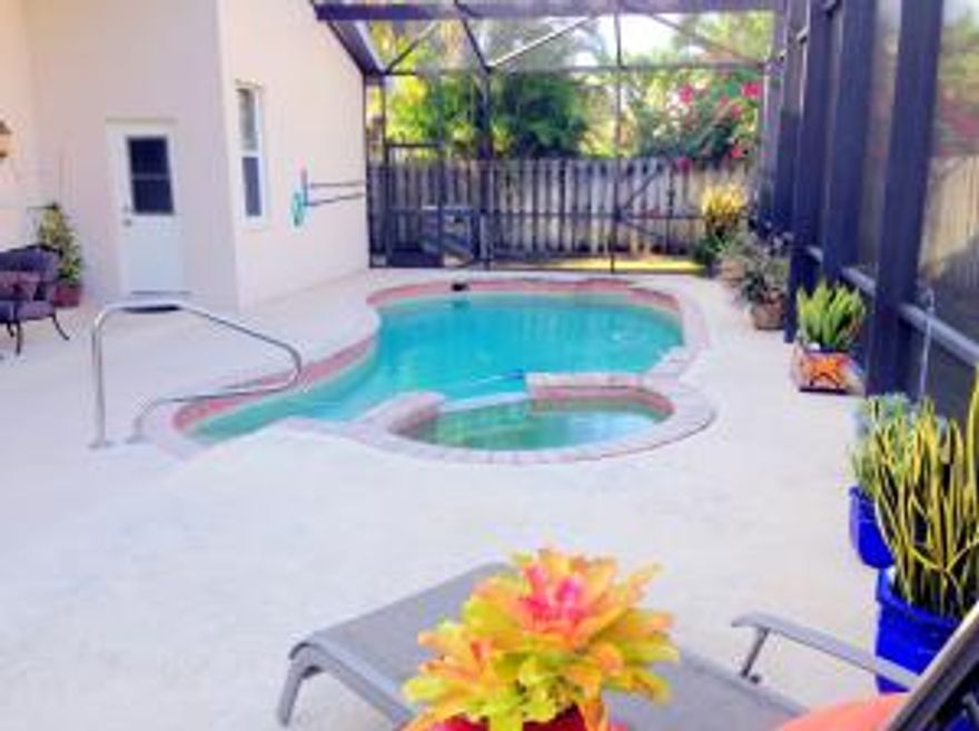 TENANT OCCUPIED UNTIL AUG 15, 2015. 24 HOURS NOTICE TO SHOW**Lovingly cared & upgraded, 3 beds 2.5 baths 2-car pool home, great for entertainment & everyday enjoyment. Gourmet kitchen with granite countertops & back-splash, expansive granite breakfast bar that opens to the eat-in area e family room with Cathedral ceilings, stunning maple cabinets, tile floors throughout, 10 ft ceiling in spacious living & dining rooms, double door entry. Screened-in pool with waterfall whirlpool spa. Separate laundry room with washer, dryer & sink. Master bedroom has double closeted dressing area, master bath with 2 vanities, roman tub & glass stall shower. NEWER A/c handler. House wired for alarm system. ** LAWNCARE & POOL SERVICE INCLUDED IN THE RENT**BASIC CABLE CURRENTLY INCLUDED IN HOA FEE ** Call now