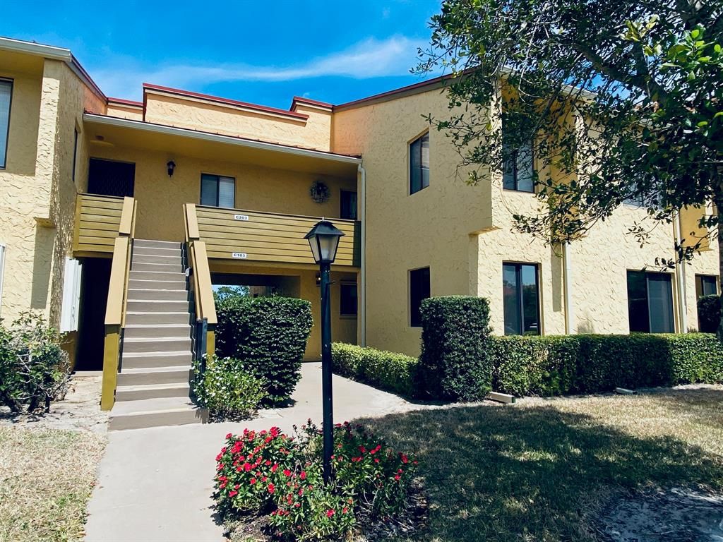 Photo of 5373 SE Miles Grant Road #C-104, Stuart, FL 34997 (MLS # R10703463)