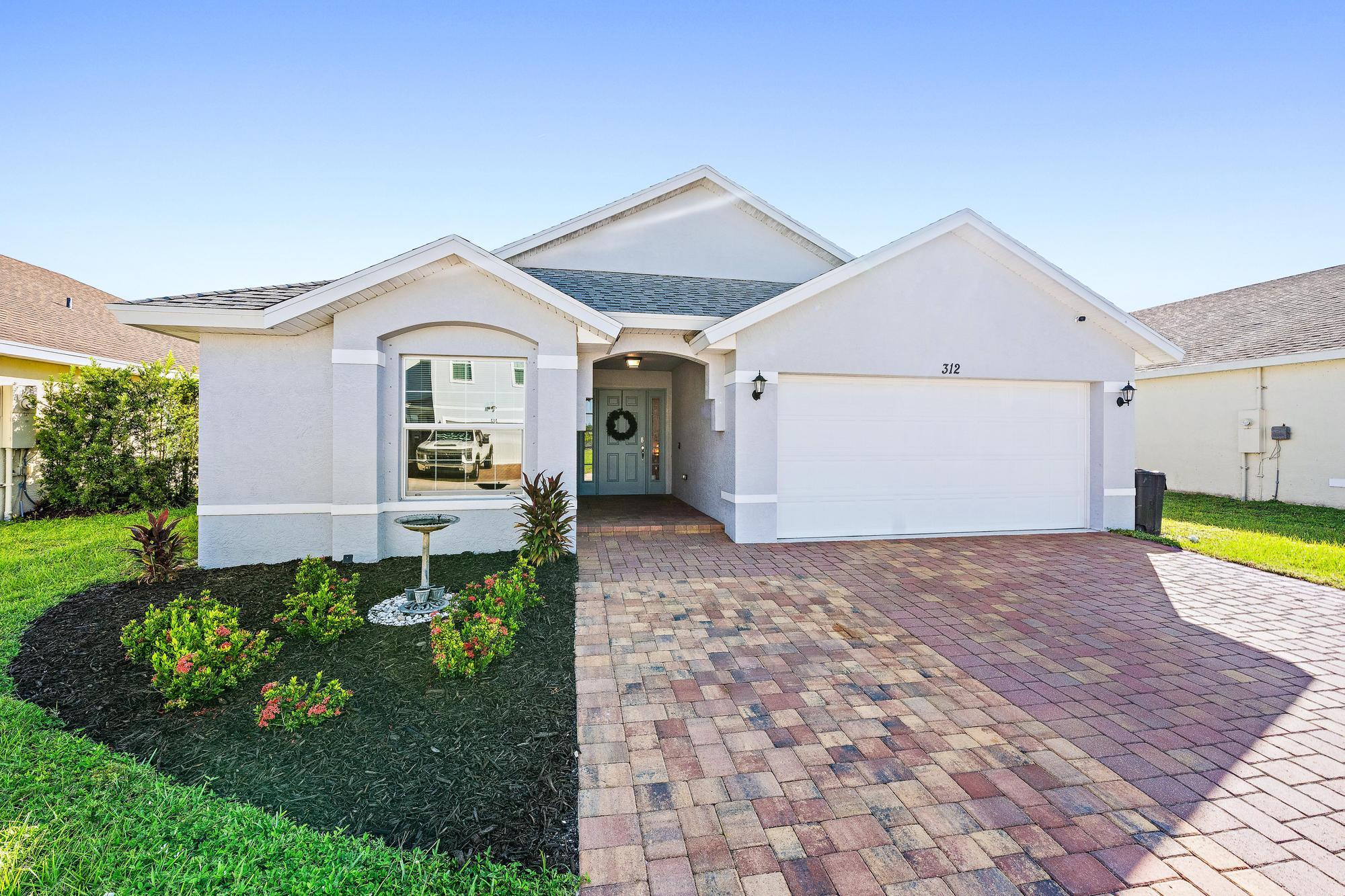 312 PALM BREEZES Drive