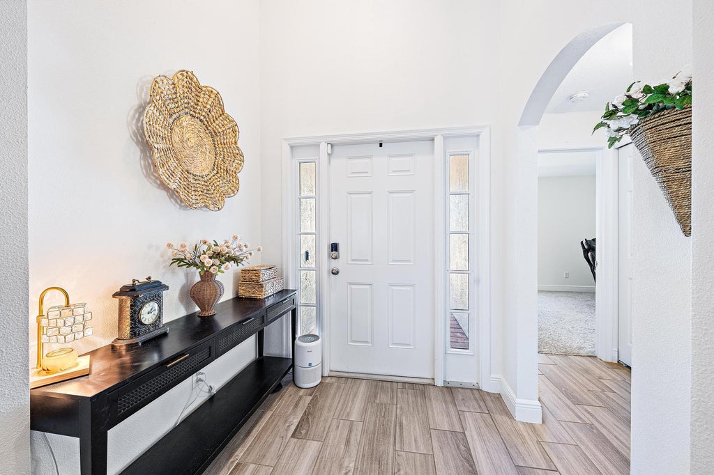 Photo of 312 PALM BREEZES Drive, Fort Pierce, FL 34945 (MLS # B26081613)