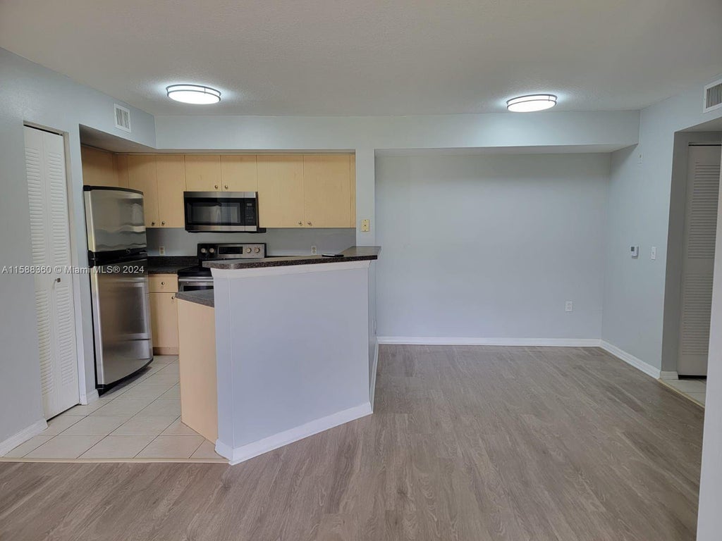 Photo of 4151 San Marino Boulevard #104, West Palm Beach, FL 33409 (MLS # R10996491)