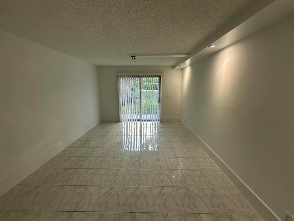 Photo of 2755 W Atlantic Avenue #D 101, Delray Beach, FL 33445 (MLS # R11113645)