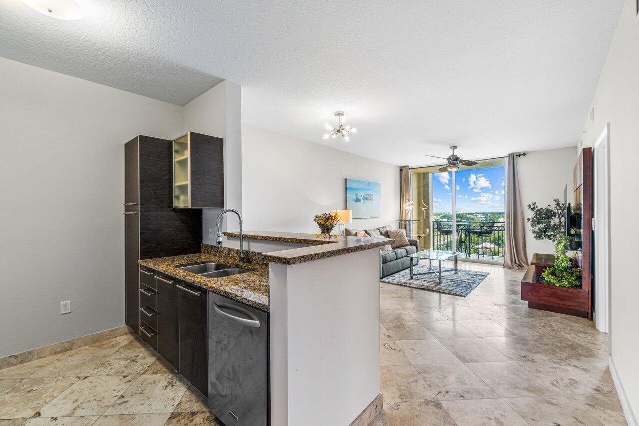 FLEXIBLE LEASE TERMS! ANNUAL OR 2026 SEASON! Luxury Resort-Style Living! Amazing, location! Come see this fully-furnished, top-floor apartment with sprawling city skyline views in the heart of Downtown! Enjoy peeks of the Intracoastal and Ocean right from your balcony! Southeastern Exposure provides dreamy views that let you breathe in the moment as you marvel at picturesque sunrises & sunsets while you sip on your coffee or wine in your very own tropical oasis. This immaculate, move-in ready retreat has been freshly refurnished and very well appointed. Smooth Travertine tile floors span the living & dining areas, kitchen and bathroom. Bedroom has comfy bamboo floors and spectacular walk-in closet with fully built-in shelves. CityPlace South Tower places you steps away from the endless