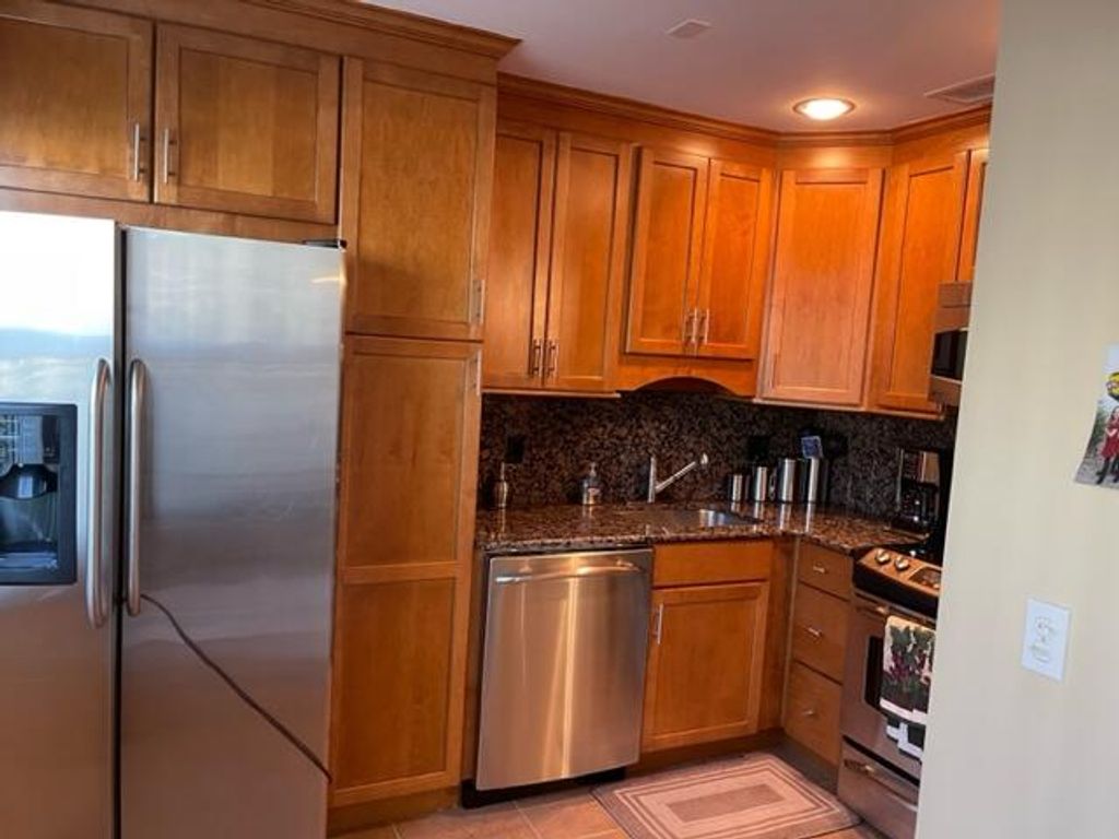 Photo of 22 Colonial Club Drive #103, Boynton Beach, FL 33435 (MLS # R11002367)