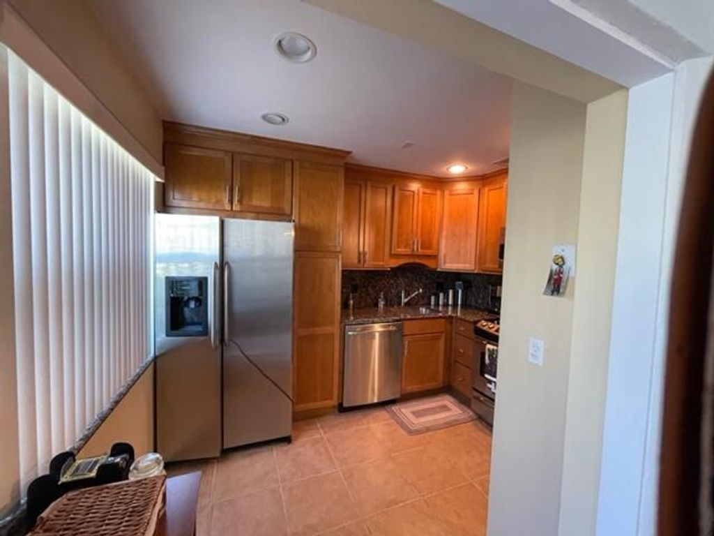 Photo of 22 Colonial Club Drive #103, Boynton Beach, FL 33435 (MLS # R11002367)
