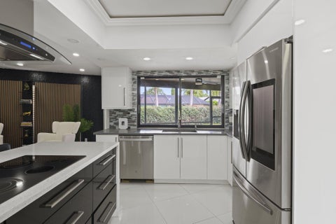 Tiny photo for 80 W RUBBER TREE Drive, Lake Worth, FL 33467 (MLS # B26087901)