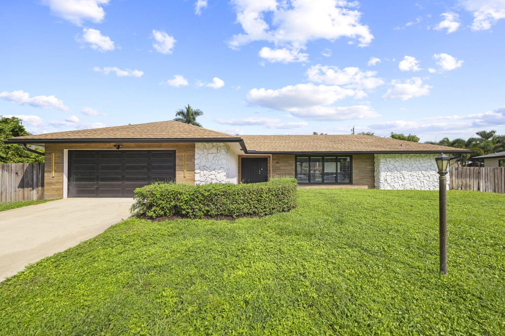 Photo of 80 W RUBBER TREE Drive, Lake Worth, FL 33467 (MLS # B26087901)