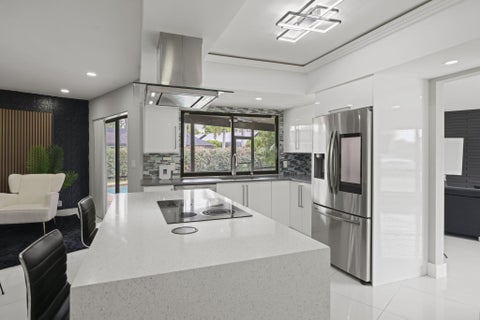 Tiny photo for 80 W RUBBER TREE Drive, Lake Worth, FL 33467 (MLS # B26087901)