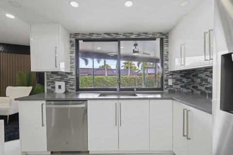 Tiny photo for 80 W RUBBER TREE Drive, Lake Worth, FL 33467 (MLS # B26087901)