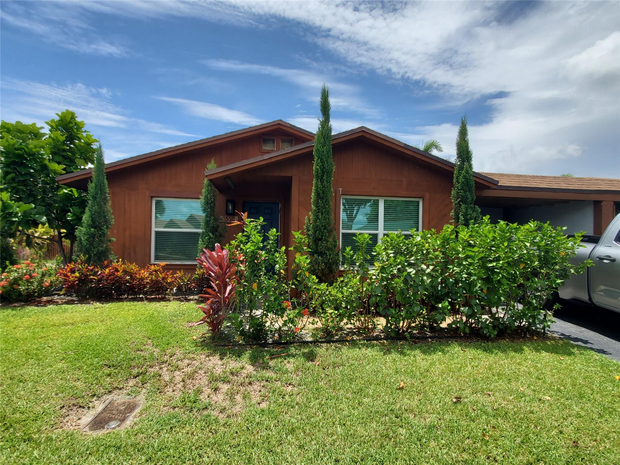Enjoy this beautiful property minutes from the beach. This 3 bedroom 2 bathroom offers plenty of entertaining areas. New appliances, kitchen, bathrooms, impact windows and paint. Large patio with spa/jacuzzi included. private outdoor area for entertaining barbecuing or relaxing. Outdoor shower. Private outside laundry room/storage room. Free cable TV, internet. 2 private pools.